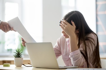 frustrated-female-employee-feeling-upset-receiving-dismissal-notice 360x240